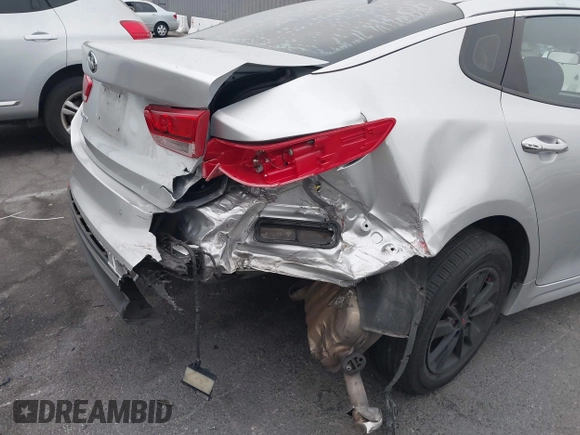 2018 Kia Optima S with VIN 5XXGT4L35JG216039, listed as a IAAI auction lot 42451216 with 91,679 mi miles and . Bid and sale history available at DreamBid. Image 6.