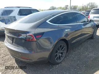 2019 Tesla Model 3 Mid Range with VIN 5YJ3E1EA5KF327679, listed as a IAAI auction lot 41804379 with 87,208 mi miles and . Bid and sale history available at DreamBid. Image 4.