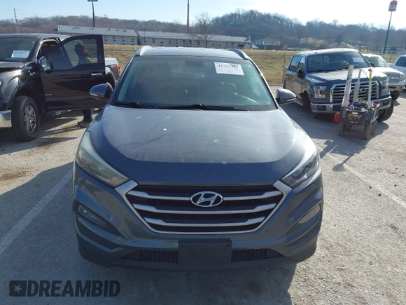 2017 Hyundai Tucson SE Plus with VIN KM8J33A40HU459575, listed as a IAAI auction lot 41703139 with 189,955 mi miles. Bid and sale history available at carsss.com. Image 12.
