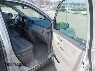 2004 Honda Odyssey EX-L with VIN 5FNRL18964B125664, listed as a IAAI auction lot 41531606 with 327,493 mi miles and . Bid and sale history available at DreamBid. Image 5.
