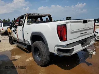 2020 GMC Sierra 3500HD Denali z VIN 1GT49WEY5LF116658, wystawiony jako Copart lot #62864934 z przebiegiem Nie podano mil oraz Szkody całkowita. Historia ofert i sprzedaży dostępna na DreamBid. Obrazek 2.