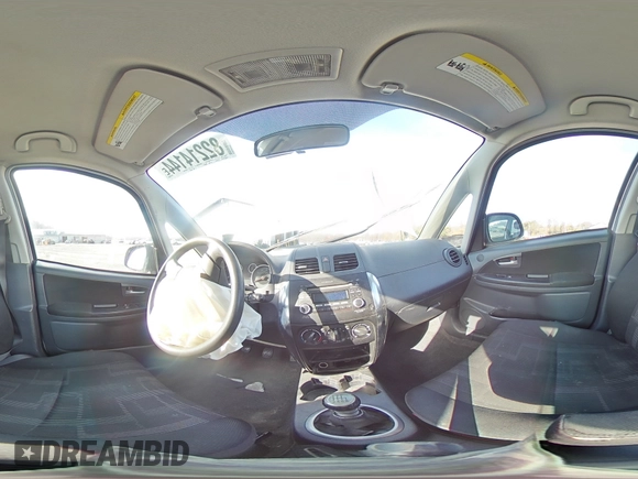 2012 Suzuki SX4 Crossover with VIN JS2YB5A32C6303887, listed as a Copart auction lot 82214144 with 0 mi miles and Salvage Title. Bid and sale history available at carsss.com. Image 12.