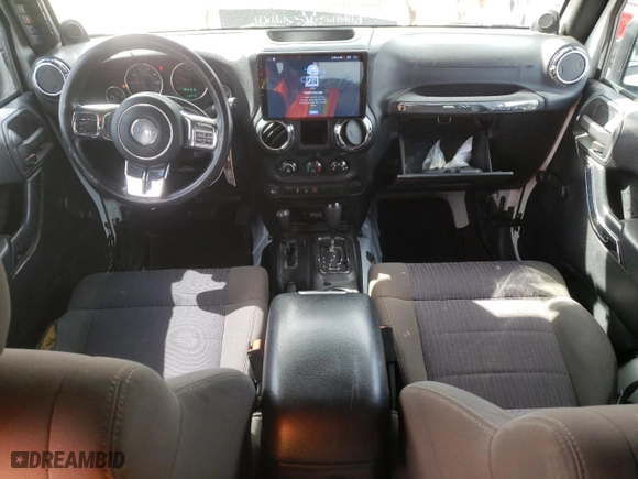 2012 Jeep Wrangler Unlimited Sport with VIN 1C4BJWDG5CL172074, listed as a Copart auction lot 52615905 with 112,275 mi miles and Salvage Title. Bid and sale history available at carsss.com. Image 8.