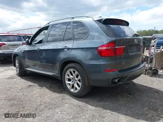2011 BMW X5 35i with VIN 5UXZV4C56BL406632, listed as a IAAI auction lot 41981590 with 168,534 mi miles. Bid and sale history available at carsss.com. Image 3.
