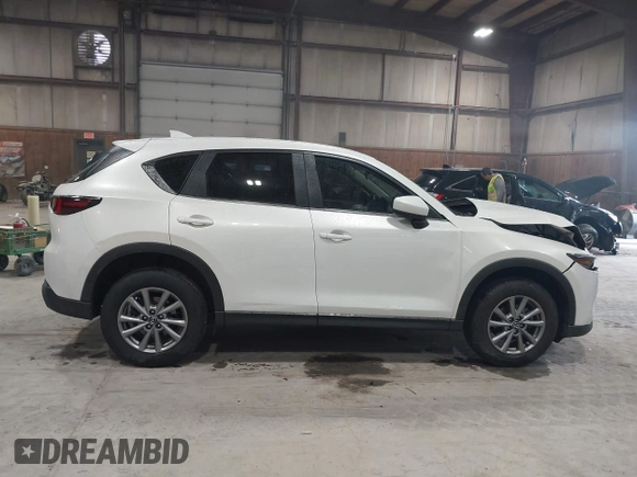 2023 Mazda CX-5 2.5 S with VIN JM3KFBAMXP0153362, listed as a IAAI auction lot 41875188 with 57,648 mi miles. Bid and sale history available at carsss.com. Image 13.
