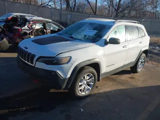 2019 Jeep Cherokee Trailhawk with VIN 1C4PJMBX8KD313712, listed as a IAAI auction lot 41448146 with 96,293 mi miles and . Bid and sale history available at DreamBid. Image 18.