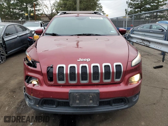 2014 Jeep Cherokee Altitude with VIN 1C4PJMCSXEW124863, listed as a Copart auction lot 82432534 with 194,559 mi miles and Salvage Title. Bid and sale history available at carsss.com. Image 5.