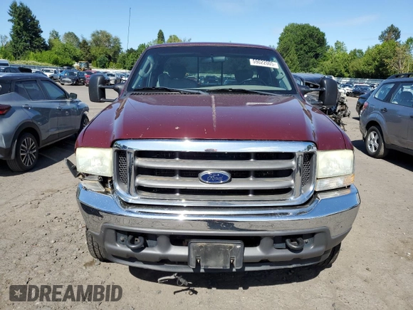 2004 Ford F-250 XL with VIN 1FTNX21P64EB90565, listed as a Copart auction lot 59022005 with 223,577 mi miles and Salvage title. Bid and sale history available at DreamBid. Image 5.