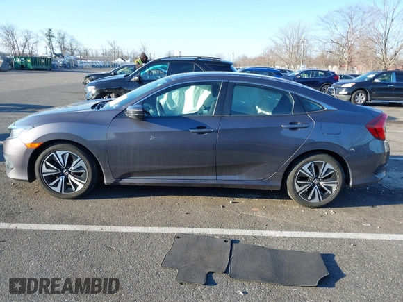 2017 Honda Civic Sedan EX-T with VIN 2HGFC1F39HH652424, listed as a IAAI auction lot 41750943 with 44,174 mi miles. Bid and sale history available at carsss.com. Image 14.