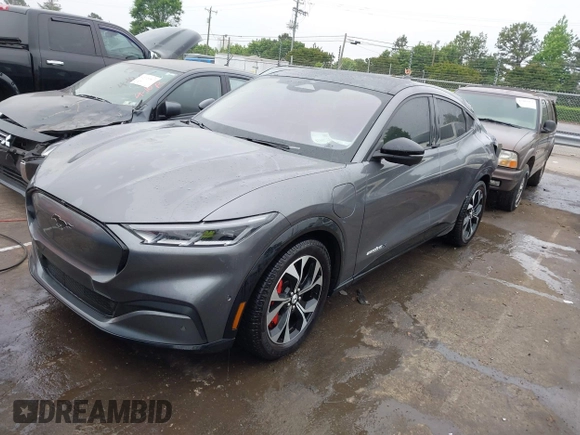 2021 Ford Mustang Mach-E Premium z VIN 3FMTK3R74MMA27709, wystawiony jako IAAI lot #42102335 z przebiegiem 54 988 mil mil oraz . Historia ofert i sprzedaży dostępna na DreamBid. Obrazek 21.