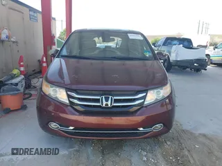 2014 Honda Odyssey Touring with VIN 5FNRL5H90EB080889, listed as a IAAI auction lot 42085305 with 123,286 mi miles and . Bid and sale history available at carsss.com. Image 12.