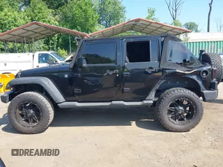 2015 Jeep Wrangler Unlimited Sport with VIN 1C4BJWDG2FL518487, listed as a IAAI auction lot 42593022 with 161,991 mi miles and . Bid and sale history available at DreamBid. Image 14.