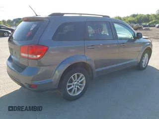2013 Dodge Journey SXT with VIN 3C4PDDBGXDT607052, listed as a IAAI auction lot 42543102 with 157,325 mi miles and . Bid and sale history available at DreamBid. Image 4.