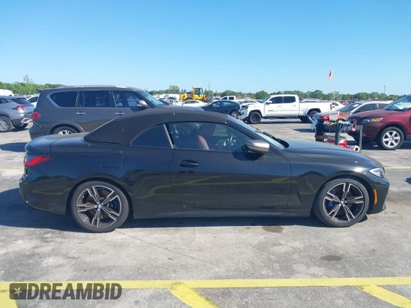 2023 BMW 4 Series M440i with VIN WBA53AT08PCL58435, listed as a IAAI auction lot 41745514 with 23,161 mi miles and . Bid and sale history available at DreamBid. Image 13.