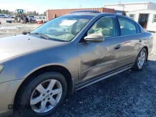 2003 Nissan Altima S with VIN 1N4AL11DX3C228986, listed as a IAAI auction lot 41767378 with 185,362 mi miles. Bid and sale history available at carsss.com. Image 6.