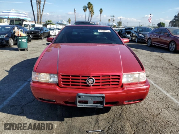 1999 Cadillac Eldorado Touring z VIN 1G6ET1293XU611368, wystawiony jako Copart lot #82683114 z przebiegiem 126 178 mil mil oraz Szkody całkowita. Historia ofert i sprzedaży dostępna na DreamBid. Obrazek 5.