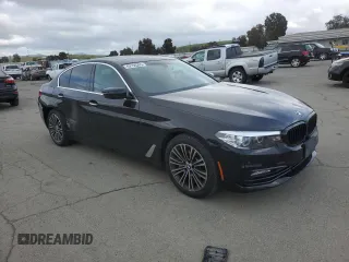 2018 BMW 5 Series 530i with VIN WBAJA5C51JWA38499, listed as a Copart auction lot 49150205 with 59,521 mi miles and Salvage Title. Bid and sale history available at DreamBid. Image 4.