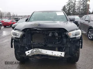 2017 Toyota Tacoma SR5 z VIN 3TMCZ5AN2HM084549, wystawiony jako IAAI lot #41834454 z przebiegiem 143 387 mil mil oraz . Historia ofert i sprzedaży dostępna na DreamBid. Obrazek 13.