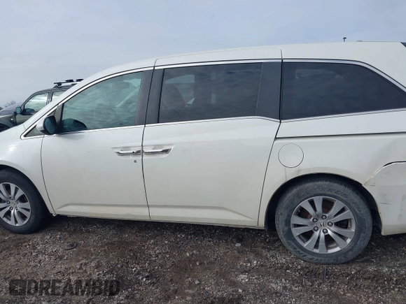 2017 Honda Odyssey EX-L with VIN 5FNRL5H62HB014449, listed as a IAAI auction lot 41736940 with 205,144 mi miles and . Bid and sale history available at DreamBid. Image 14.