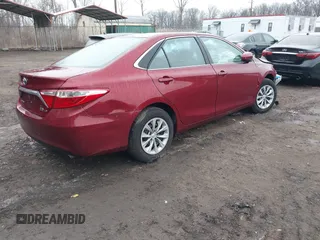 2017 Toyota Camry Hybrid LE with VIN 4T1BD1FK9HU209135, listed as a IAAI auction lot 41668852 with 98,808 mi miles. Bid and sale history available at carsss.com. Image 4.
