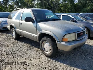 2000 GMC Jimmy SLS Base with VIN 1GKCS18W0YK167906, listed as a Copart auction lot 73840484 with 141,230 mi miles and Salvage Title. Bid and sale history available at carsss.com. Image 4.