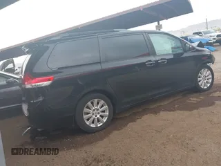 2014 Toyota Sienna XLE with VIN 5TDYK3DC0ES518522, listed as a IAAI auction lot 42025124 with 1 mi miles. Bid and sale history available at carsss.com. Image 4.