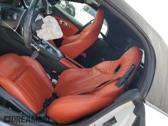2020 BMW Z4 sDrive30i with VIN WBAHF3C06LWW83982, listed as a Copart auction lot 66076064 with 71,855 mi miles and Salvage Title. Bid and sale history available at carsss.com. Image 7.
