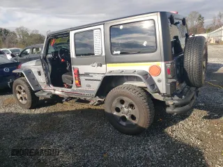2018 Jeep Wrangler JK Unlimited Altitude with VIN 1C4BJWEGXJL936447, listed as a Copart auction lot 82546004 with 150,053 mi miles and Salvage Title. Bid and sale history available at carsss.com. Image 2.