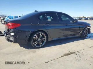 2020 BMW 5 Series M550i xDrive with VIN WBAJS7C07LCD97275, listed as a Copart auction lot 85764434 with Not provided miles and Clean title. Bid and sale history available at DreamBid. Image 3.