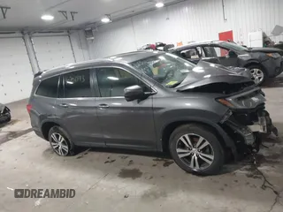 2017 Honda Pilot EX-L with VIN 5FNYF6H51HB080796, listed as a IAAI auction lot 40702843 with Not Provided miles and . Bid and sale history available at DreamBid. Image 12.