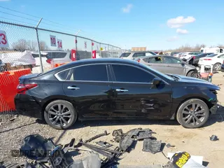 2018 Nissan Altima 2.5 SR with VIN 1N4AL3AP7JC276044, listed as a IAAI auction lot 41898554 with 103,329 mi miles. Bid and sale history available at carsss.com. Image 14.
