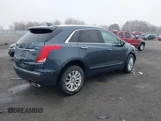 2019 Cadillac XT5 FWD with VIN 1GYKNARS5KZ220134, listed as a IAAI auction lot 41472927 with 58,229 mi miles and . Bid and sale history available at DreamBid. Image 4.