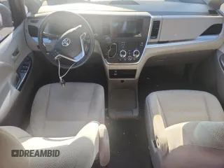 2015 Toyota Sienna L with VIN 5TDZK3DC6FS609767, listed as a Copart auction lot 61188585 with 136,286 mi miles and Salvage title. Bid and sale history available at DreamBid. Image 8.