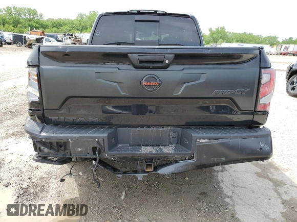 2021 Nissan Titan Pro-4X with VIN 1N6AA1ED0MN528002, listed as a Copart auction lot 54779885 with 33,235 mi miles and Salvage title. Bid and sale history available at DreamBid. Image 6.