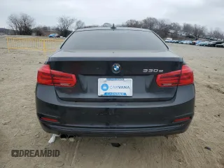 2017 BMW 3 Series 330e iPerformance with VIN WBA8E1C58HK895185, listed as a Copart auction lot 49287055 with 61,391 mi miles and Salvage Title. Bid and sale history available at carsss.com. Image 6.