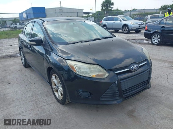 2014 Ford Focus SE with VIN 1FADP3F22EL102502, listed as a IAAI auction lot 41969213 with 154,946 mi miles. Bid and sale history available at carsss.com. Image 1.