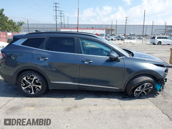 2023 Kia Sportage EX with VIN KNDPVCAG4P7014112, listed as a IAAI auction lot 42610022 with 50,680 mi miles and . Bid and sale history available at DreamBid. Image 14.
