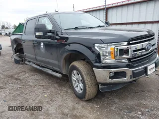 2018 Ford F-150 XL with VIN 1FTEW1EB0JKD85702, listed as a IAAI auction lot 41207356 with 136,528 mi miles. Bid and sale history available at carsss.com. Image 1.