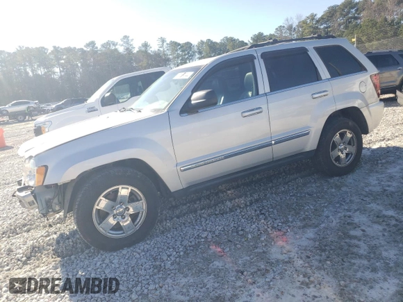2006 Jeep Grand Cherokee Limited with VIN 1J8HS58N36C122006, listed as a Copart auction lot 87159044 with 225,987 mi miles and Salvage title. Bid and sale history available at DreamBid. Image 1.