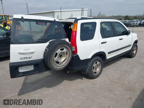 2004 Honda CR-V LX with VIN JHLRD68454C004803, listed as a IAAI auction lot 41910388 with 192,766 mi miles and . Bid and sale history available at carsss.com. Image 4.