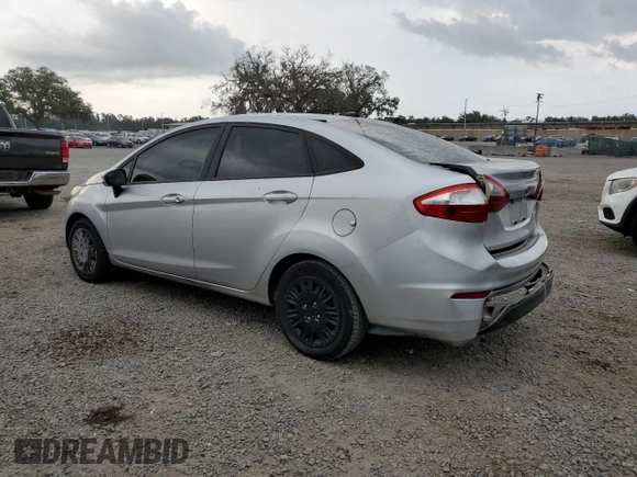 2016 Ford Fiesta S z VIN 3FADP4AJXGM153848, wystawiony jako Copart lot #57865195 z przebiegiem 128 858 mil mil oraz Szkoda całkowita • Salvage title. Historia ofert i sprzedaży dostępna na DreamBid. Obrazek 2.