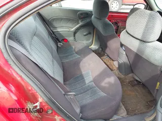 2004 Pontiac Grand Am SE with VIN 1G2NE52F24C222067, listed as a IAAI auction lot 41549466 with 205,545 mi miles. Bid and sale history available at carsss.com. Image 8.