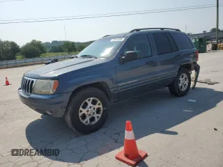 2002 Jeep Grand Cherokee Laredo with VIN 1J4GW48S92C319161, listed as a Copart auction lot 59304035 with 257,907 mi miles and Salvage title. Bid and sale history available at DreamBid. Image 1.