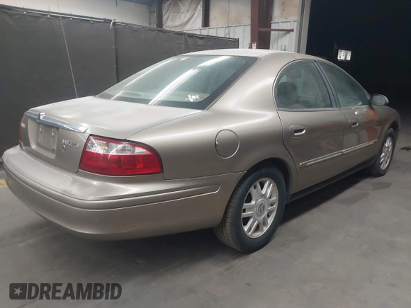 2004 Mercury Sable LS Premium z VIN 1MEFM55S54G601180, wystawiony jako IAAI lot #42162460 z przebiegiem 104 613 mil mil oraz . Historia ofert i sprzedaży dostępna na DreamBid. Obrazek 4.