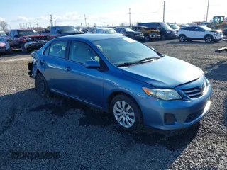 2013 Toyota Corolla L with VIN 5YFBU4EE2DP127014, listed as a IAAI auction lot 41729189 with 156,673 mi miles. Bid and sale history available at carsss.com. Image 1.