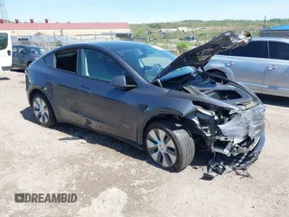 2023 Tesla Model Y Long Range z VIN 7SAYGDEE8PA191415, wystawiony jako IAAI lot #42155577 z przebiegiem 42 149 mil mil oraz . Historia ofert i sprzedaży dostępna na DreamBid. Obrazek 1.