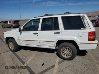 1995 Jeep Grand Cherokee Limited with VIN 1J4GZ78Y3SC701103, listed as a Copart auction lot 72038184 with 143,829 mi miles and Salvage Title. Bid and sale history available at carsss.com. Image 2.