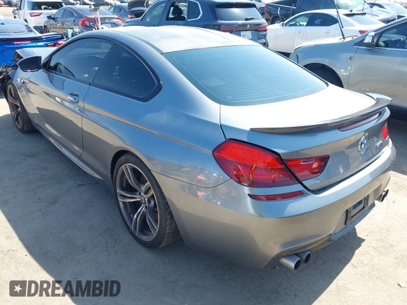 2013 BMW M6 with VIN WBSLX9C51DC968593, listed as a IAAI auction lot 42465979 with 88,010 mi miles and . Bid and sale history available at DreamBid. Image 3.
