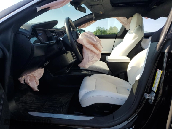 2018 Tesla Model S 75D with VIN 5YJSA1E21JF284845, listed as a Copart auction lot 62549885 with Not provided miles and Clean title. Bid and sale history available at DreamBid. Image 7.
