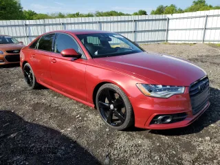 2015 Audi A6 with VIN WAUHMBFC1FN027544, listed as a Copart auction lot 53960404 with 104,428 mi miles and Salvage title. Bid and sale history available at DreamBid. Image 4.